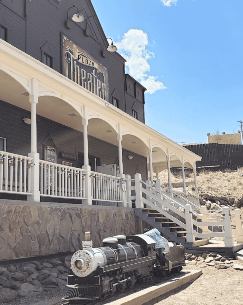 Miniature train engine outside the Plaza theater